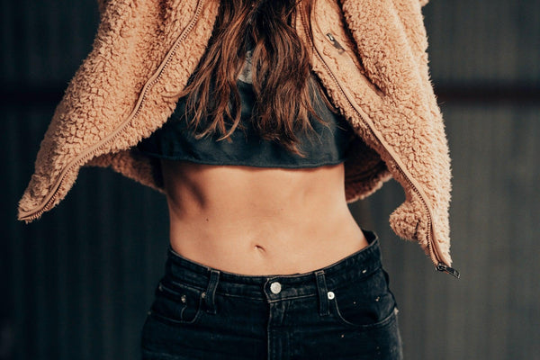 a picture of a woman with toned Abs