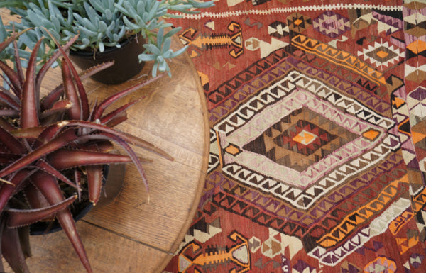 http://www.floorplanrugs.com/products/vintage-anatolian-kilim-with-five-layered-medallions-52-x-14