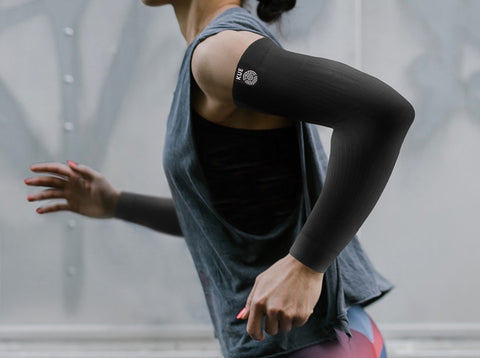 Girl running in arm sleeves