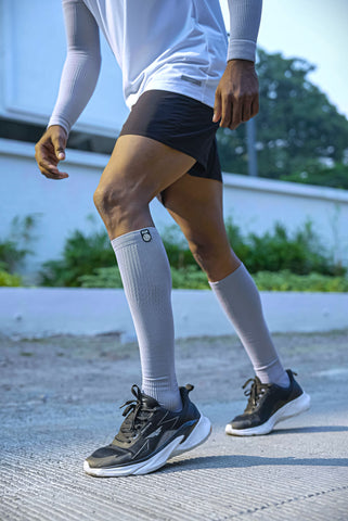 boy walking in KUE compression socks