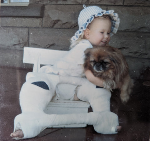 Me, Beverley Nettelton, in a plaster cast with mum's Pekingese, Lilibet