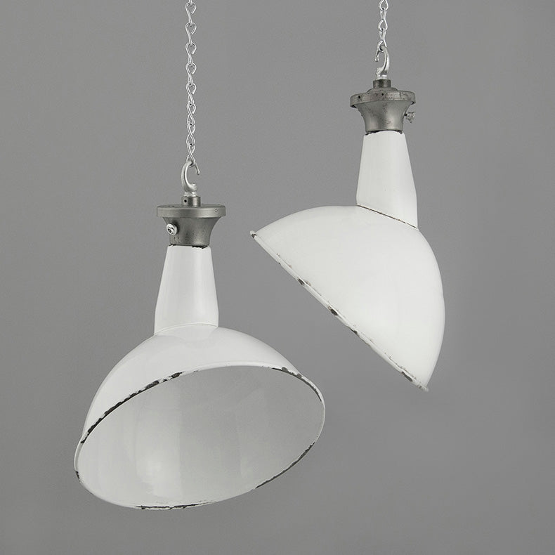 Angled white enamel pendant lights by Benjamin