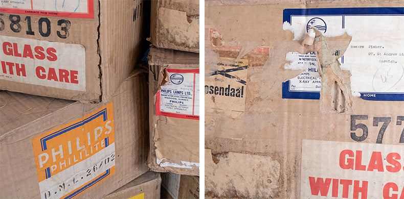 side by side close ups of the original delivery boxes of skinflints vintage phililite pendants 