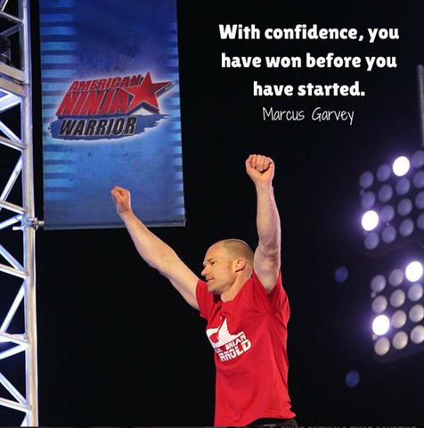 Brian Arnold celebrates getting the furthest on the American Ninja Warrior course