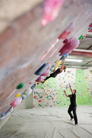 Neely Quinn of TrainingBeta training at an indoor climbing gym