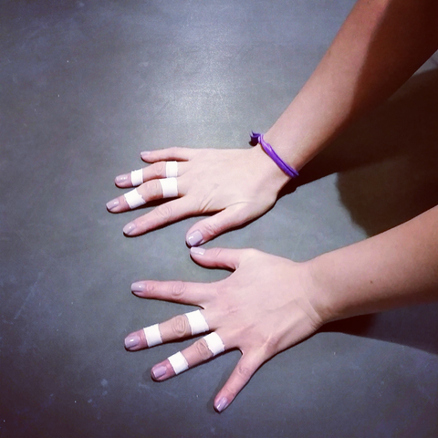 Bouldering Babes taped climber hands