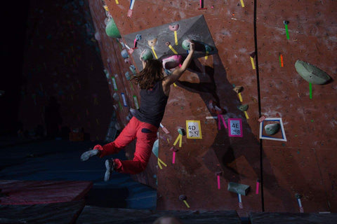 Zoe Steinberg bouldering in the climbing gym