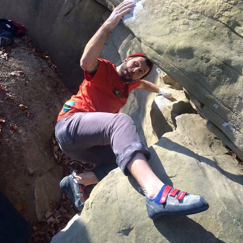 Jon Sedor bouldering outside on sandstone