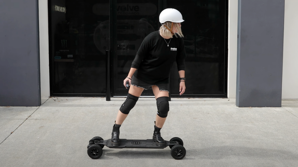 girl wearing skate protective gear