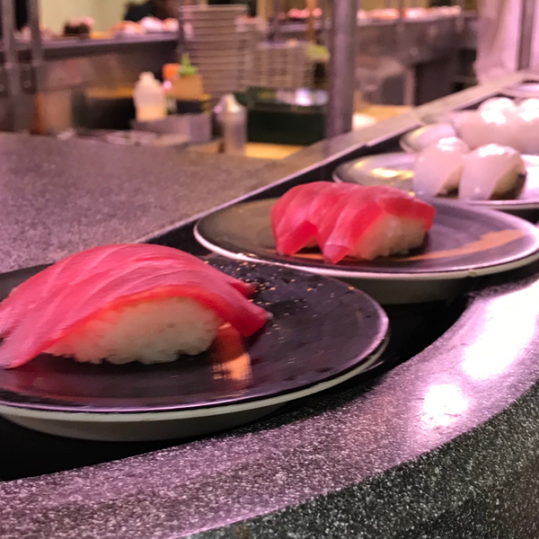 Sushi conveyor belt in action
