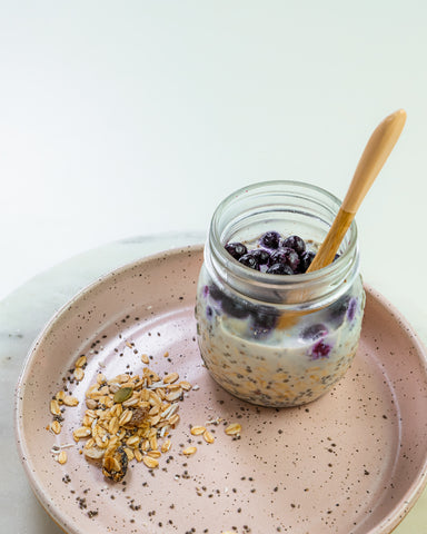 blueberry chia oats in a jar with spoon