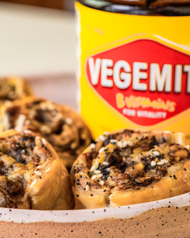cheese and vegemite scrolls with seeds on top