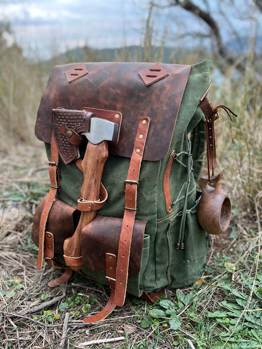 https://cdn.shopify.com/s/files/1/0666/7616/2772/products/camping-backpack-camping-backpacks-hiking-backpack-brown-green-handmade-leather-canvas-rucksack-camping-bushcraft-personalization-backpackrucksack-861947.jpg?v=1697485557&width=533