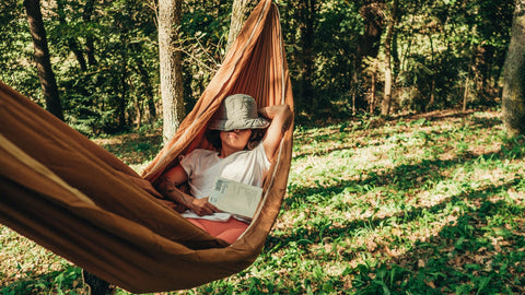 Woman Relaxing in Hammock