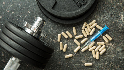 barbell and pills