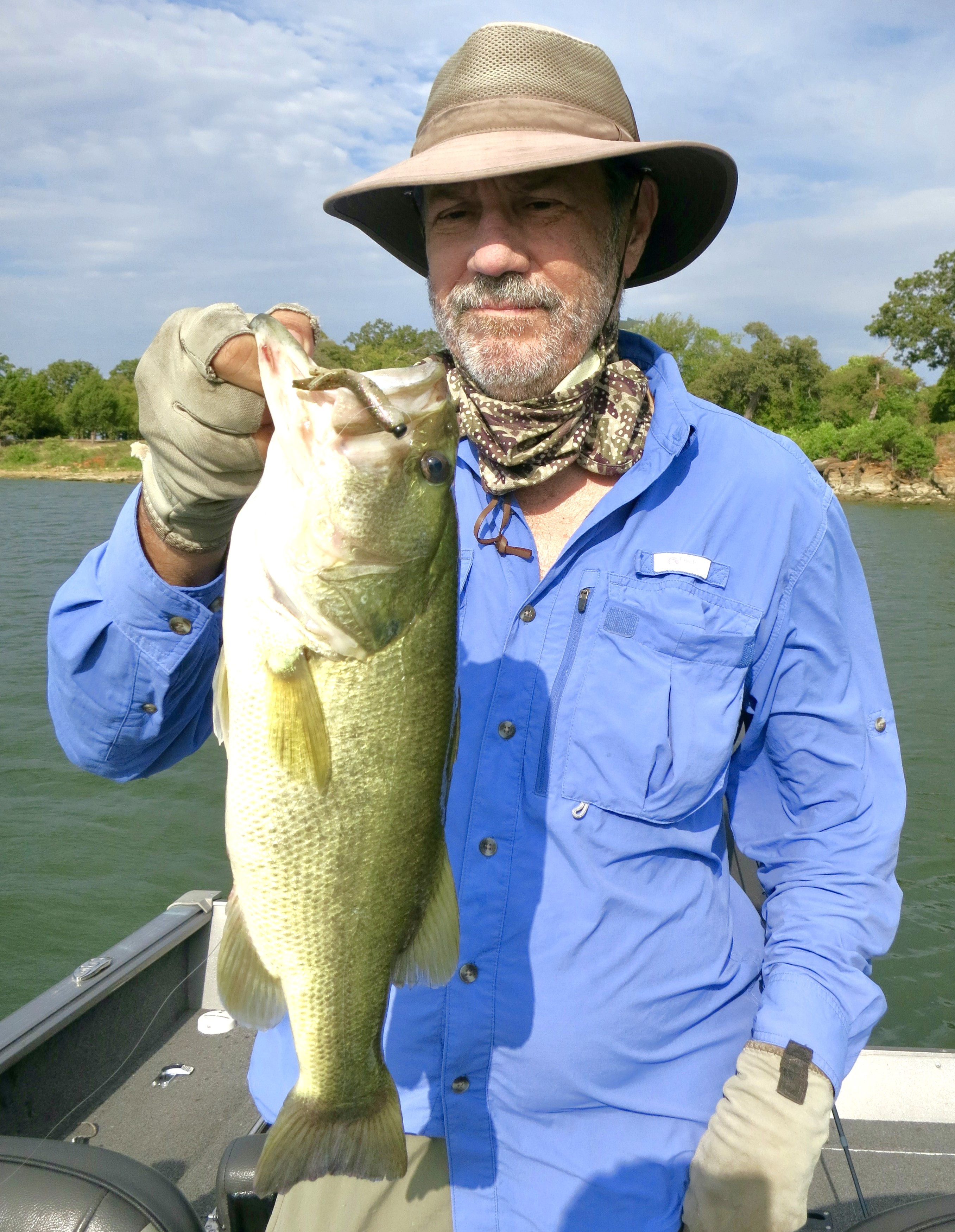 Gentleman holding Large Mouth Bass