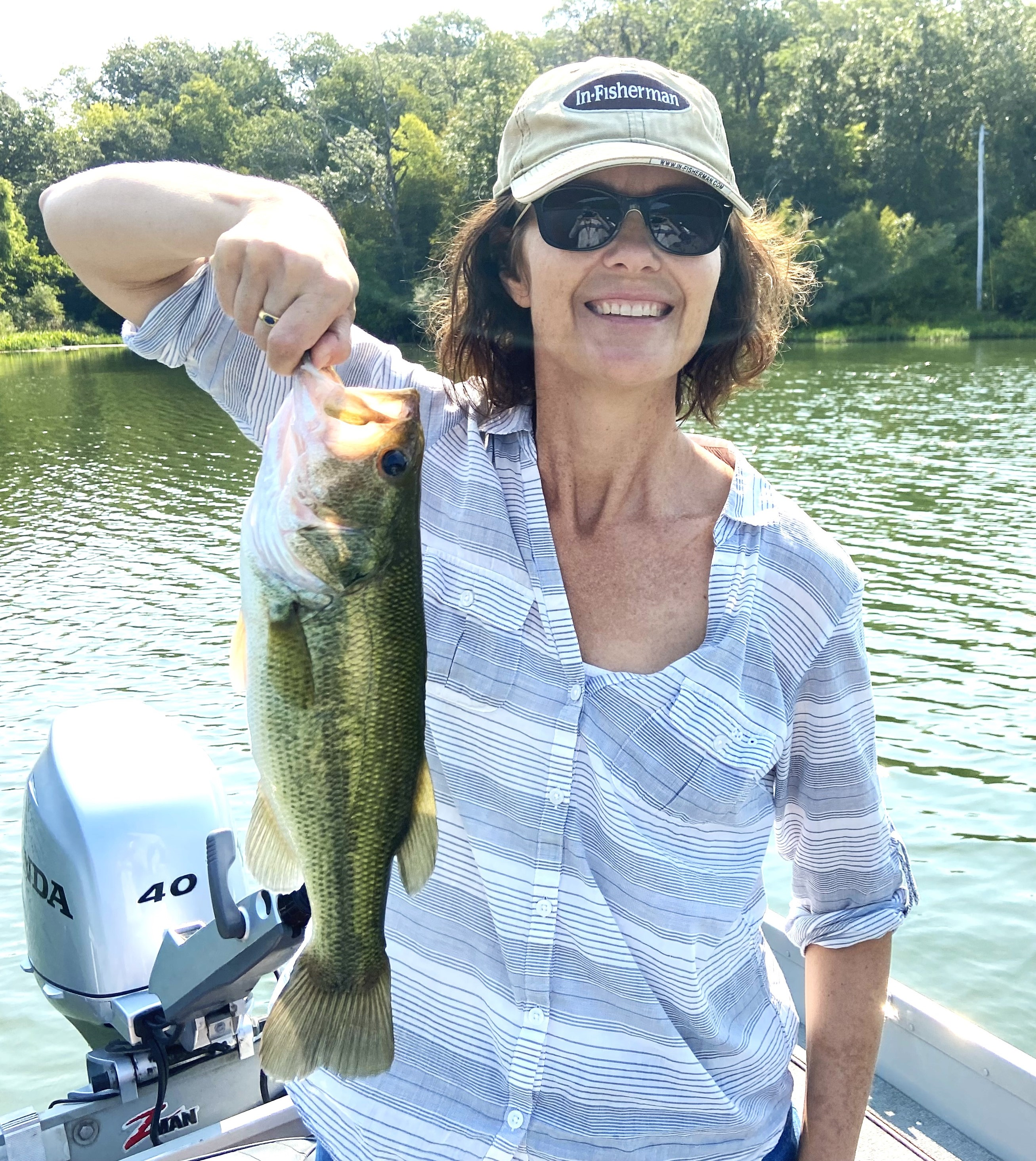 Woman with a Large Mouth Bass