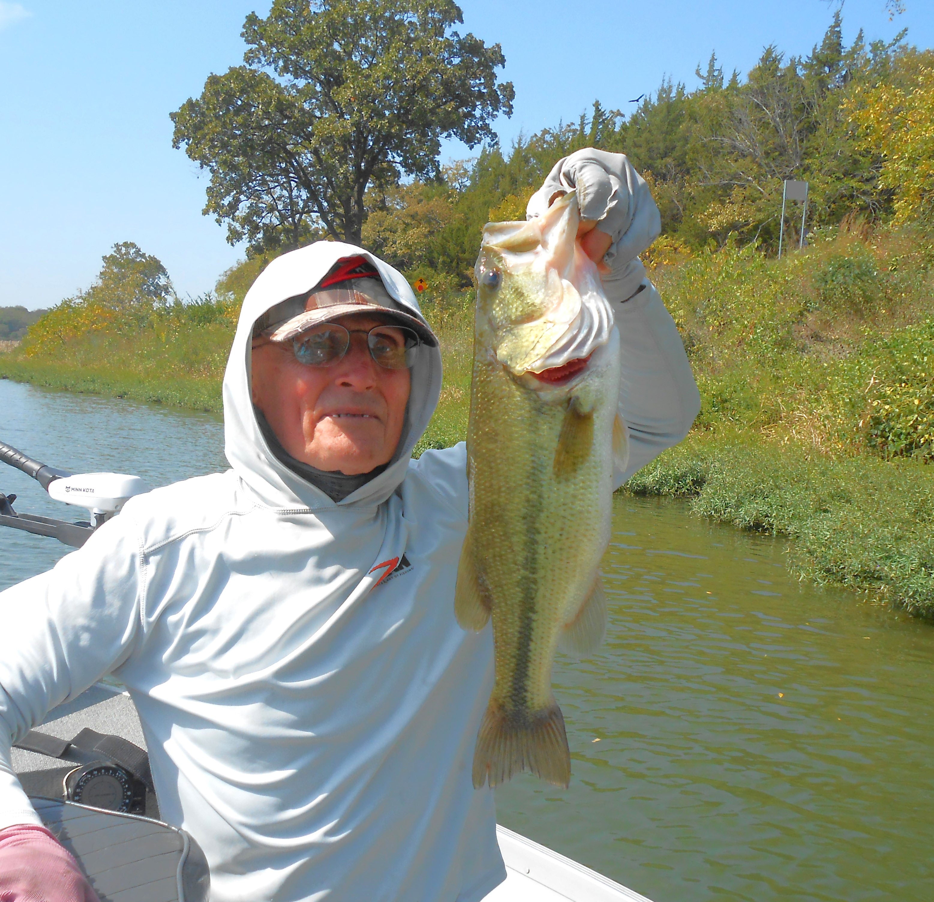 Ned Kehde with a Large mouth bass he caught