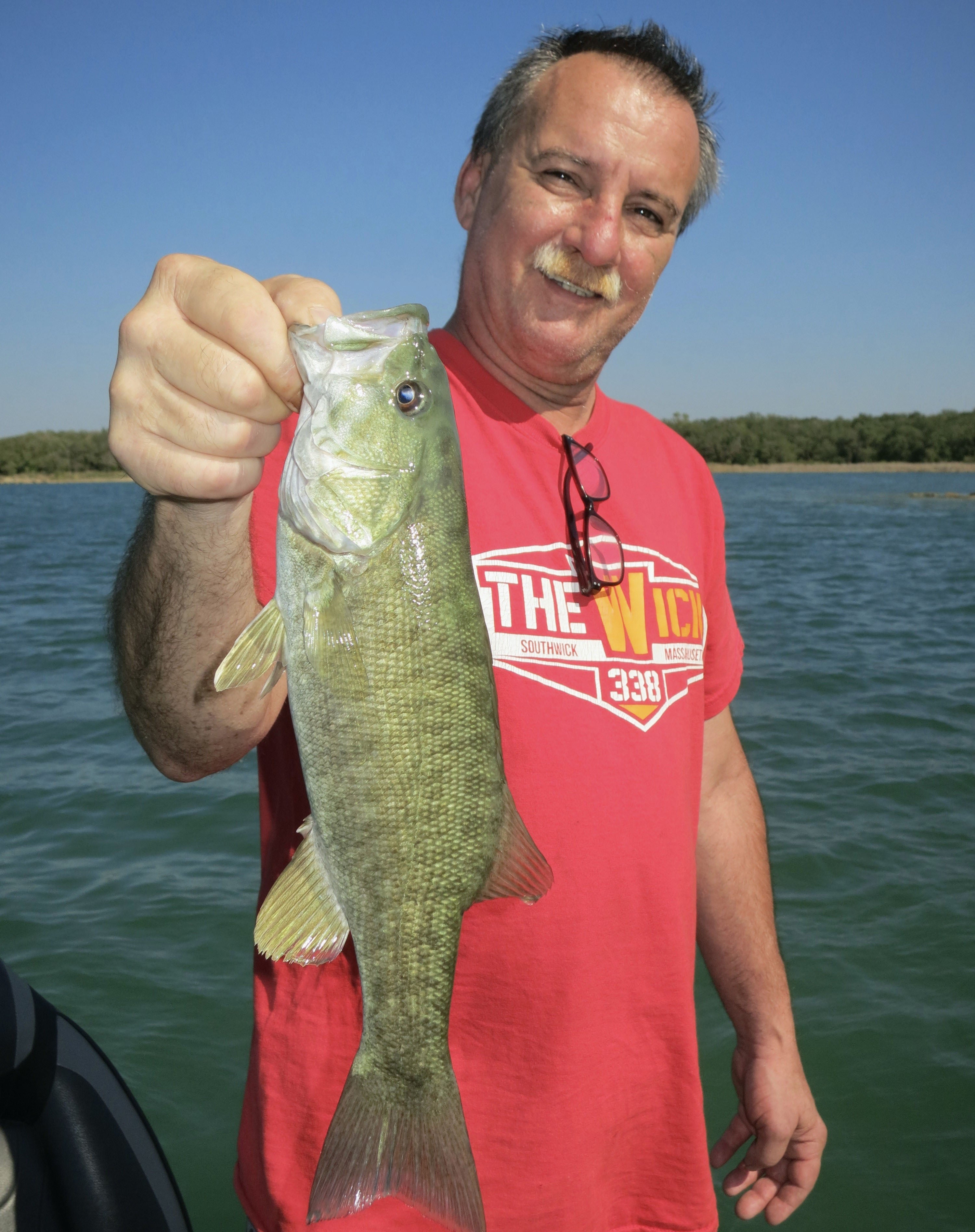 Gentleman with a large mouth bass