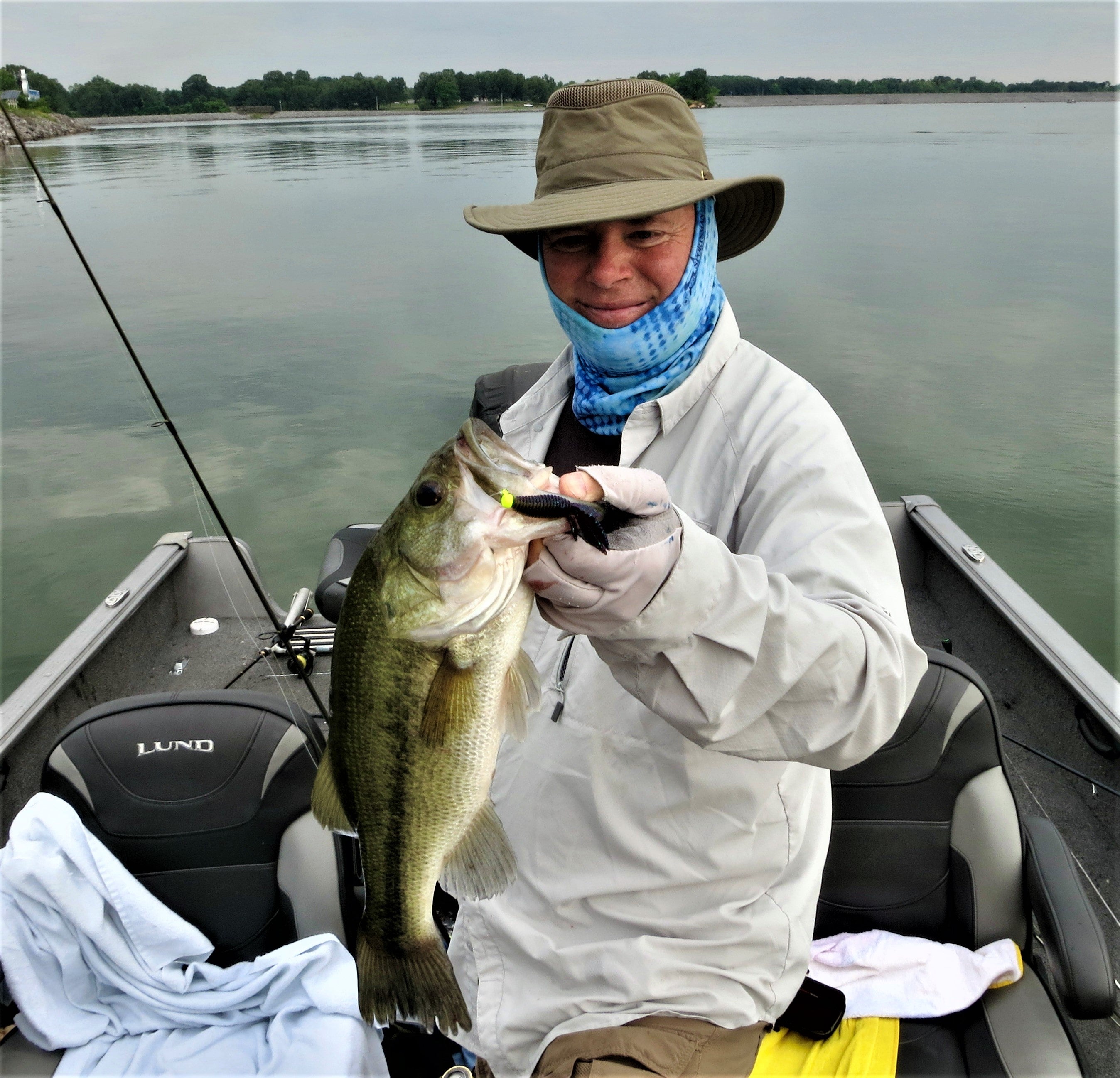 Gentleman with Large mouth bass he caught