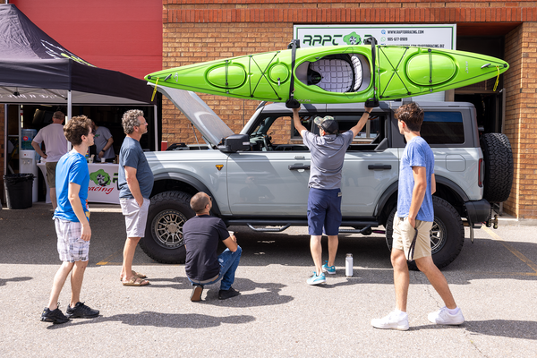 Kayak mounted on or shop's Ford Bronco.