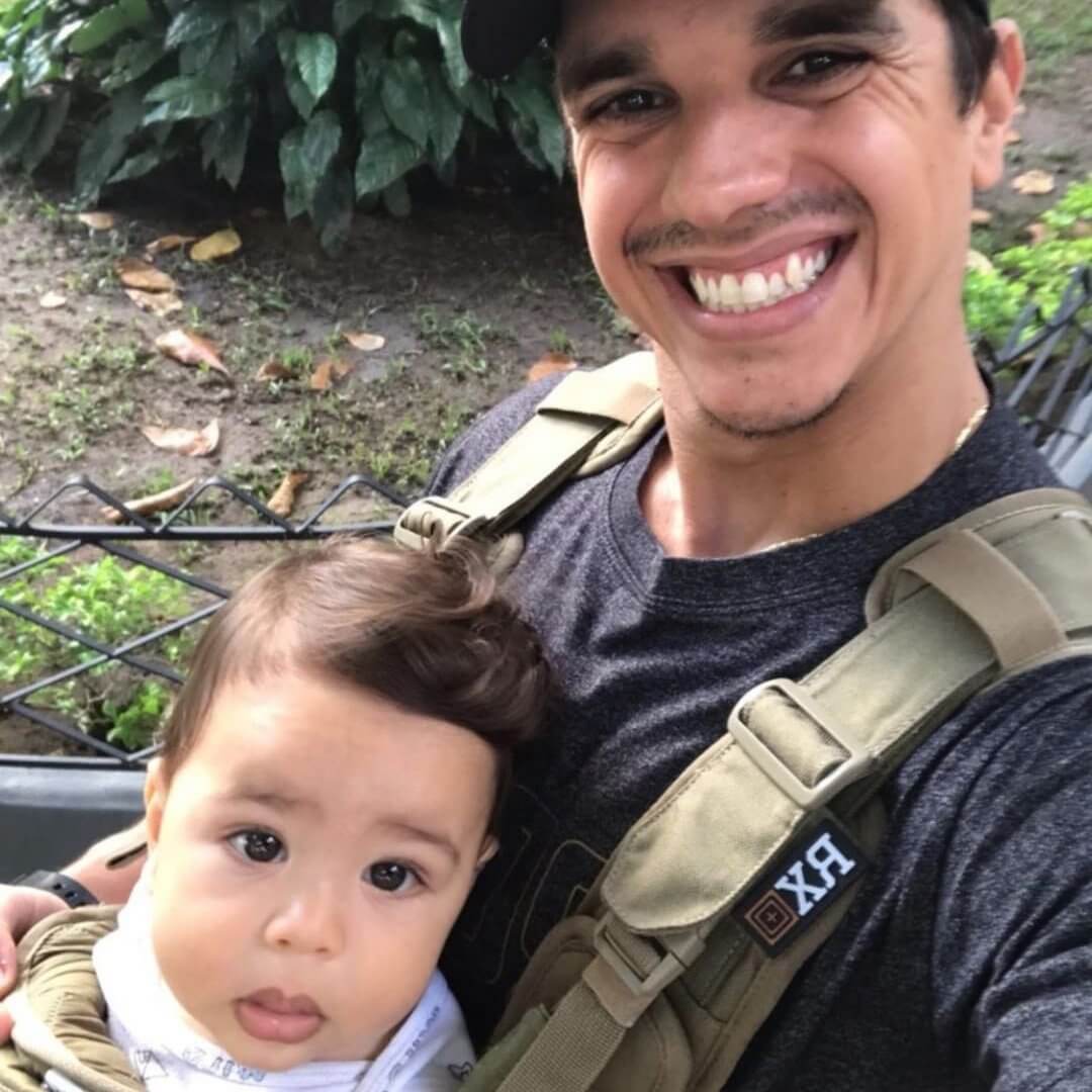 Baby and Dad Wearing the S.01 Action Baby Carrier - Mission Critical