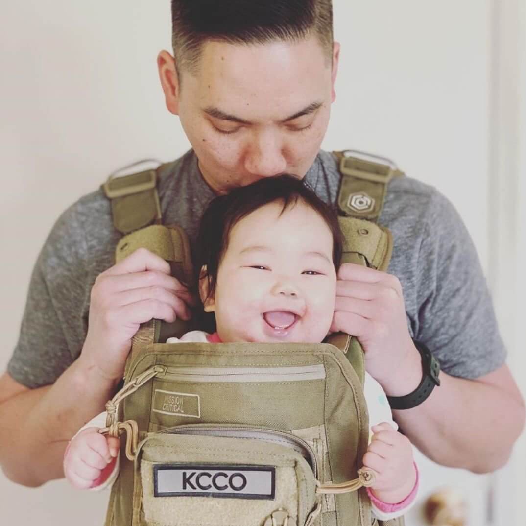 Dad and Baby in the S.01 Tactical Style Baby Carrier - Mission Critical