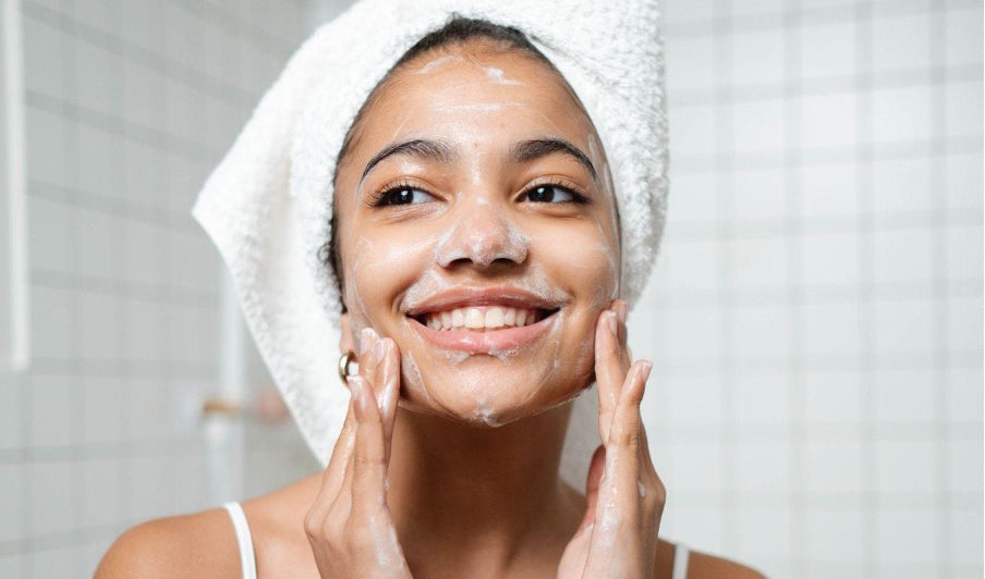 woman doing her skin care routine with clean products