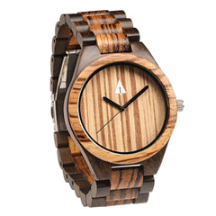 The all wooden watch is equipped with high quality Japan quartz movement and stainless steel tri-fold clasp with push buttons. Diameter of the dial 1.7 inches. Strap and case are made of 100% wood with zebra wood framed with beautiful dark Ebony.  • Ship Next Business Day!  • Watch and Watch Band Made from Real Wood • Japanese Quartz Movement  • Strap Made from Real Wood • Clasp Made from Stainless Steel Tri-Fold with Push Buttons  • Minimalist Design • Durable & Long Lasting