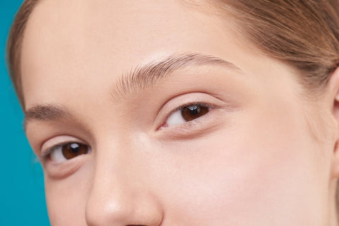 Cropped photo of a barefaced person’s eyes