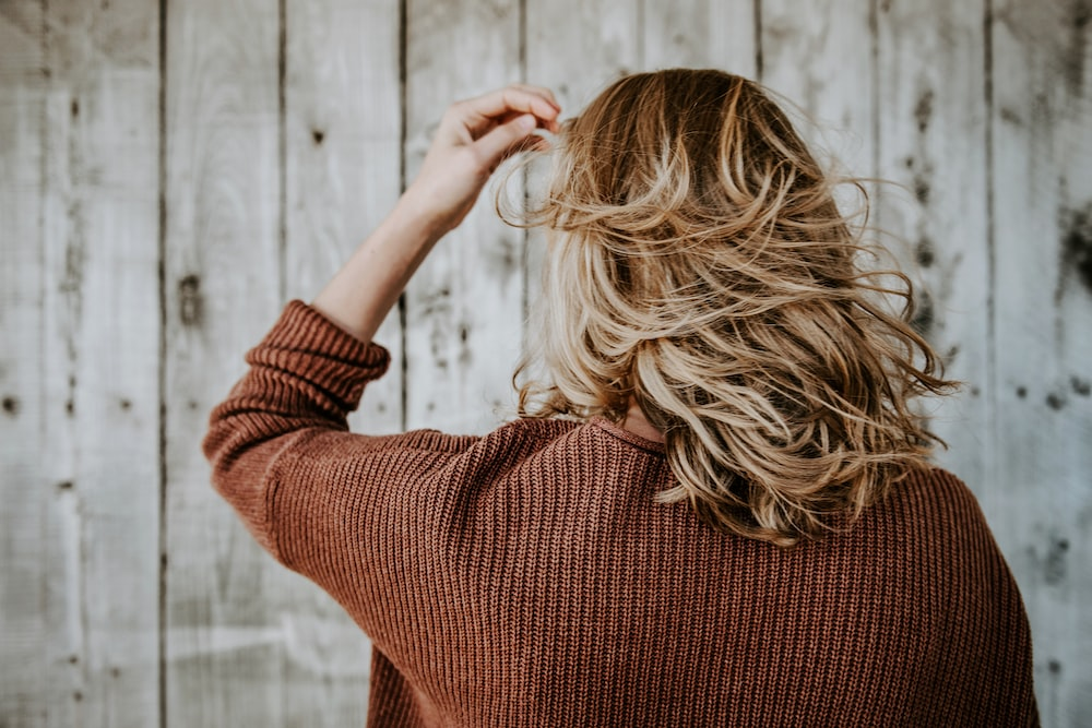 a woman with blonde hair.