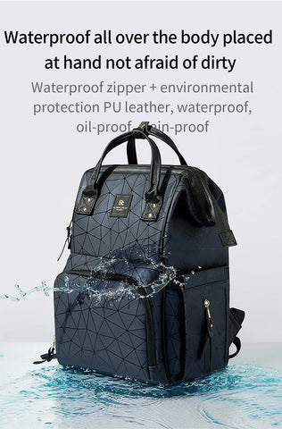 Aibedila Mommy Bag showcasing its waterproof design, providing protection for essentials in unexpected weather.