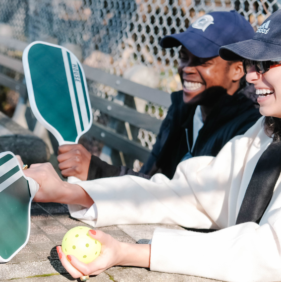 friends playing pickleball