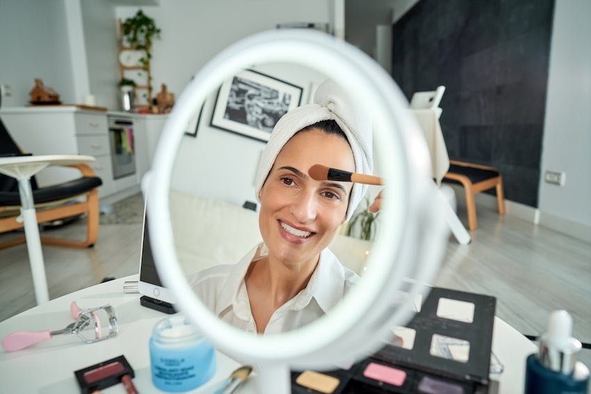 Woman applying foundation