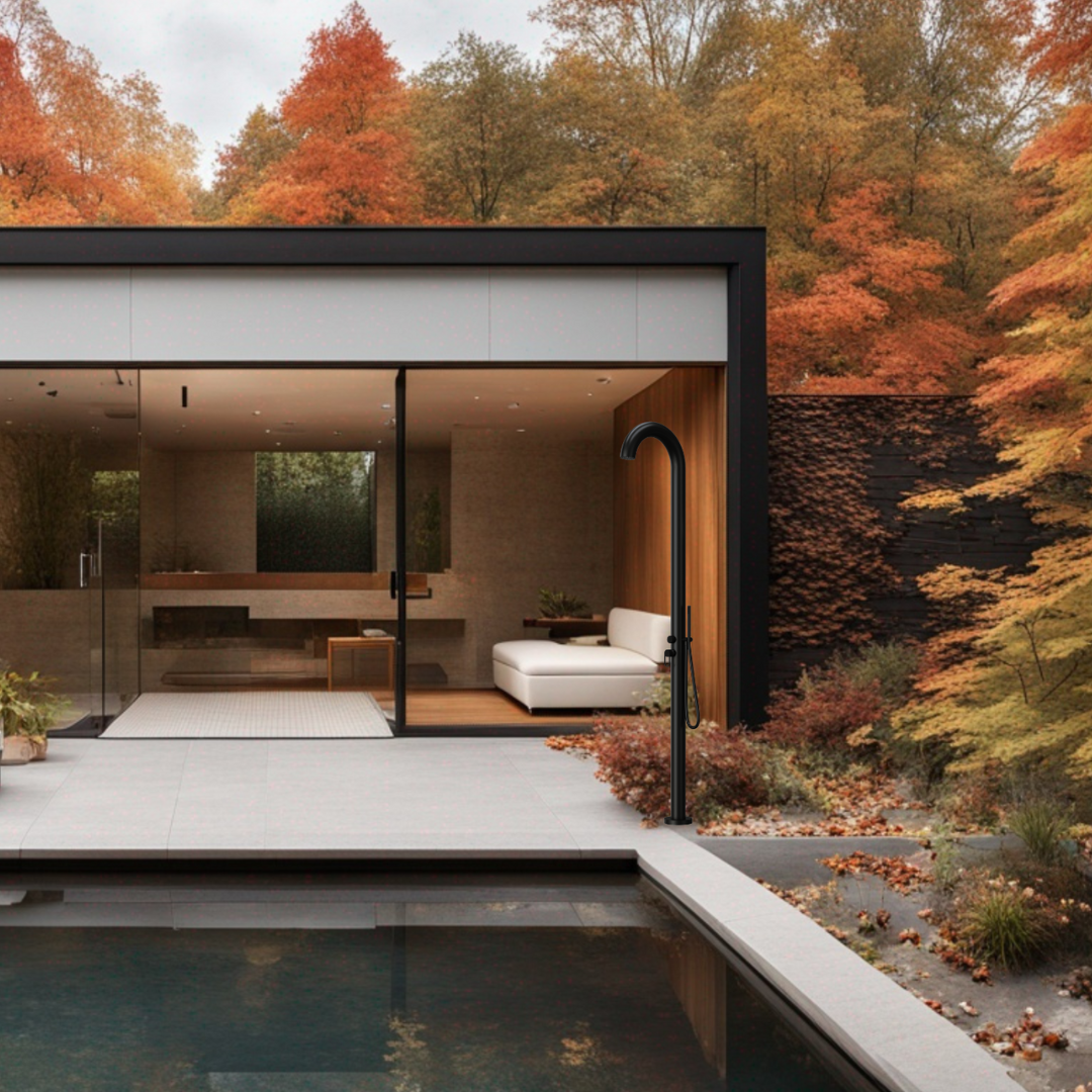 outdoor shower with sleek design against backdrop of a minimal house in fall season