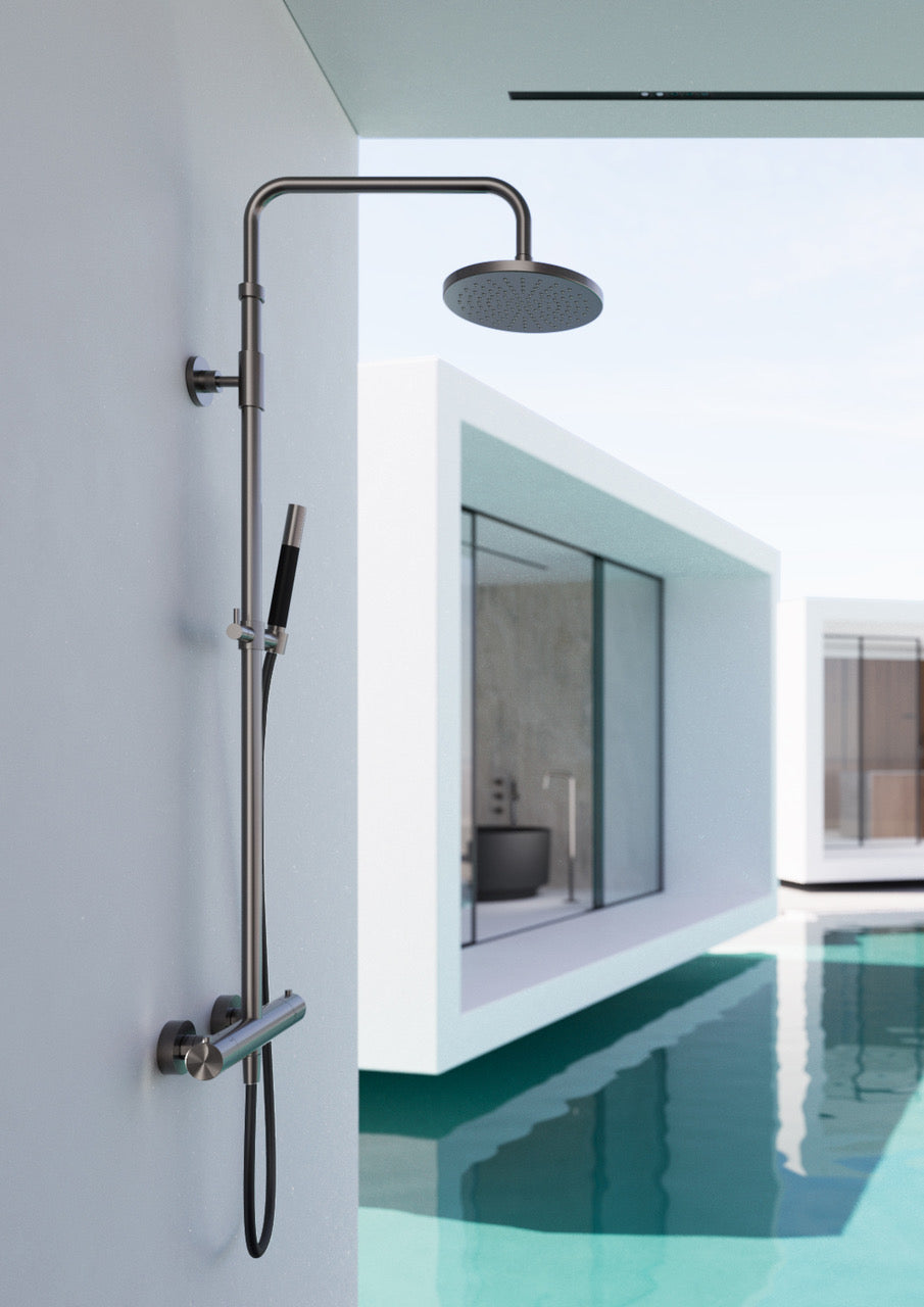 Freestanding 316 marine grade stainless steel outdoor pool shower fixtures with hand shower, foot wash, rain shower head, pressure balance valve, thermostatic valve, volume control, and push button valves, in brushed, polished, matte black, and brass copper tone finishes.