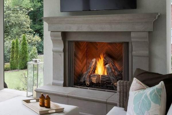 Outdoor gas fireplace in outdoor kitchen