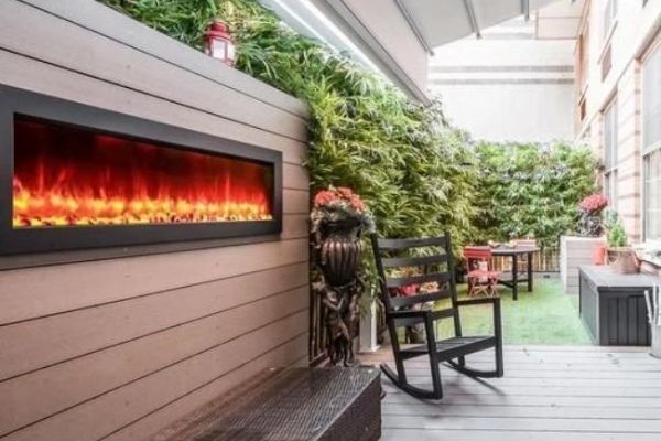 Electric fireplace in outdoor dining area