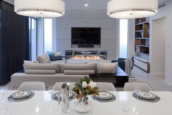 Ethanol fireplace in open concept living and dining area
