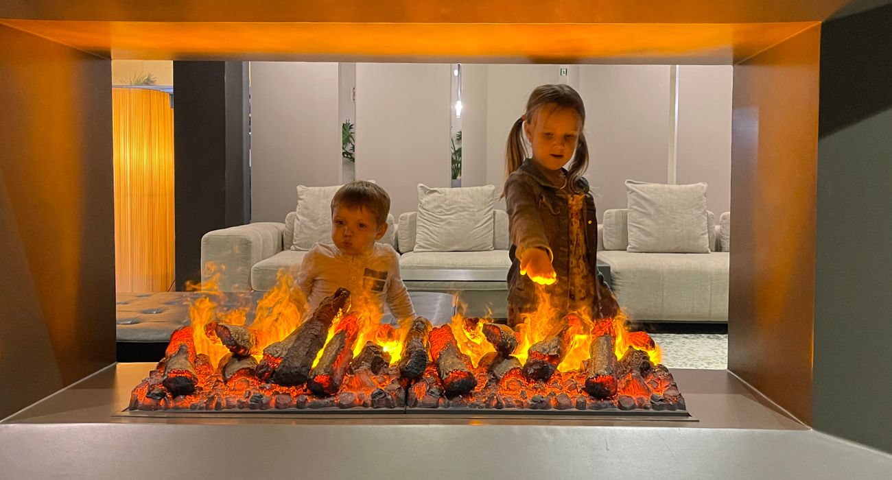 Kids playing with Water Vapor Fireplace Flames