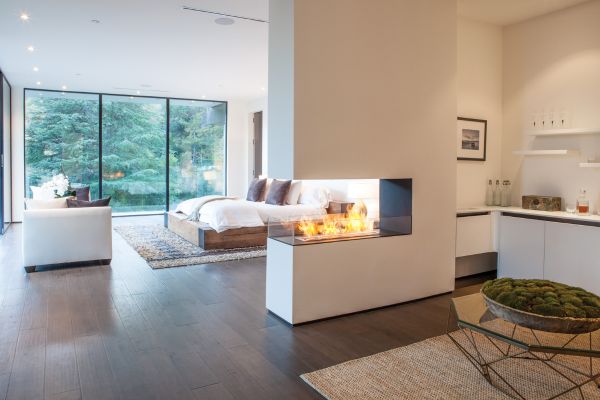 Eco-friendly ethanol fireplace in room divider