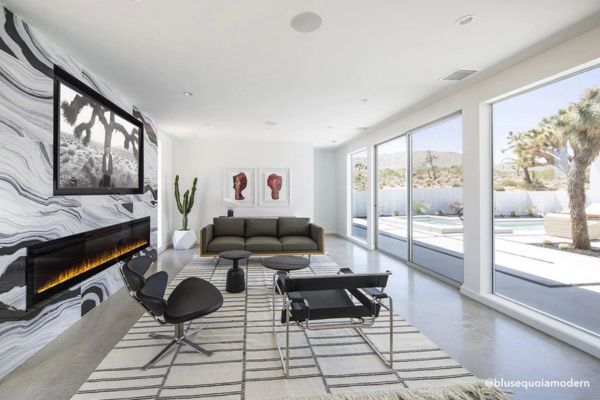 Marble Accent Wall with Modern Fireplace and TV