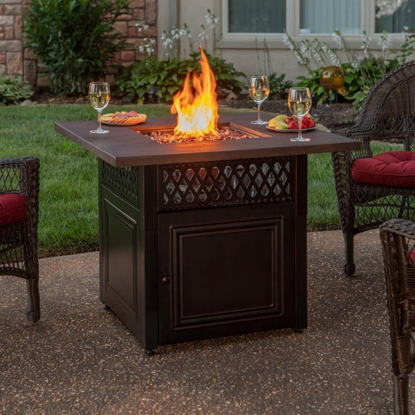 Endless Summer Donovan 38" DualHeat LP Fire Pit Table GAD19102ES in a patio