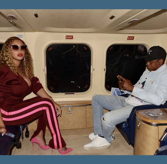 BEYONCE WEARING FOR ART'S SAKE LITTLE CHAOS SUNGLASSES IN ROSE WITH JAY-Z IN THEIR PRIVATE JET