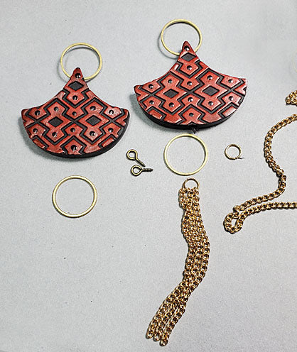 photo shows clay and jewelry findings used to assemble earrings