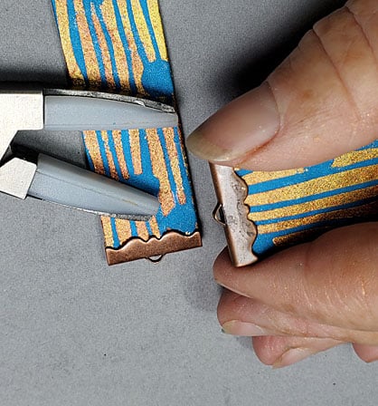 photo shows adding crimps with pliers