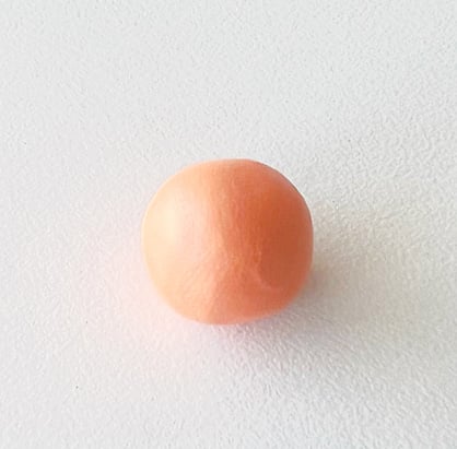 photo shows ball of mixed clay