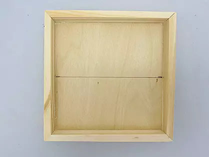 photo shows wood tray with center line drawn in