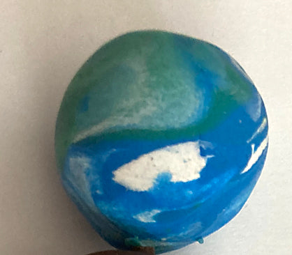 photo shows marbled ball of colors