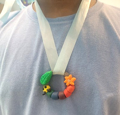 photo shows student wearing pendant